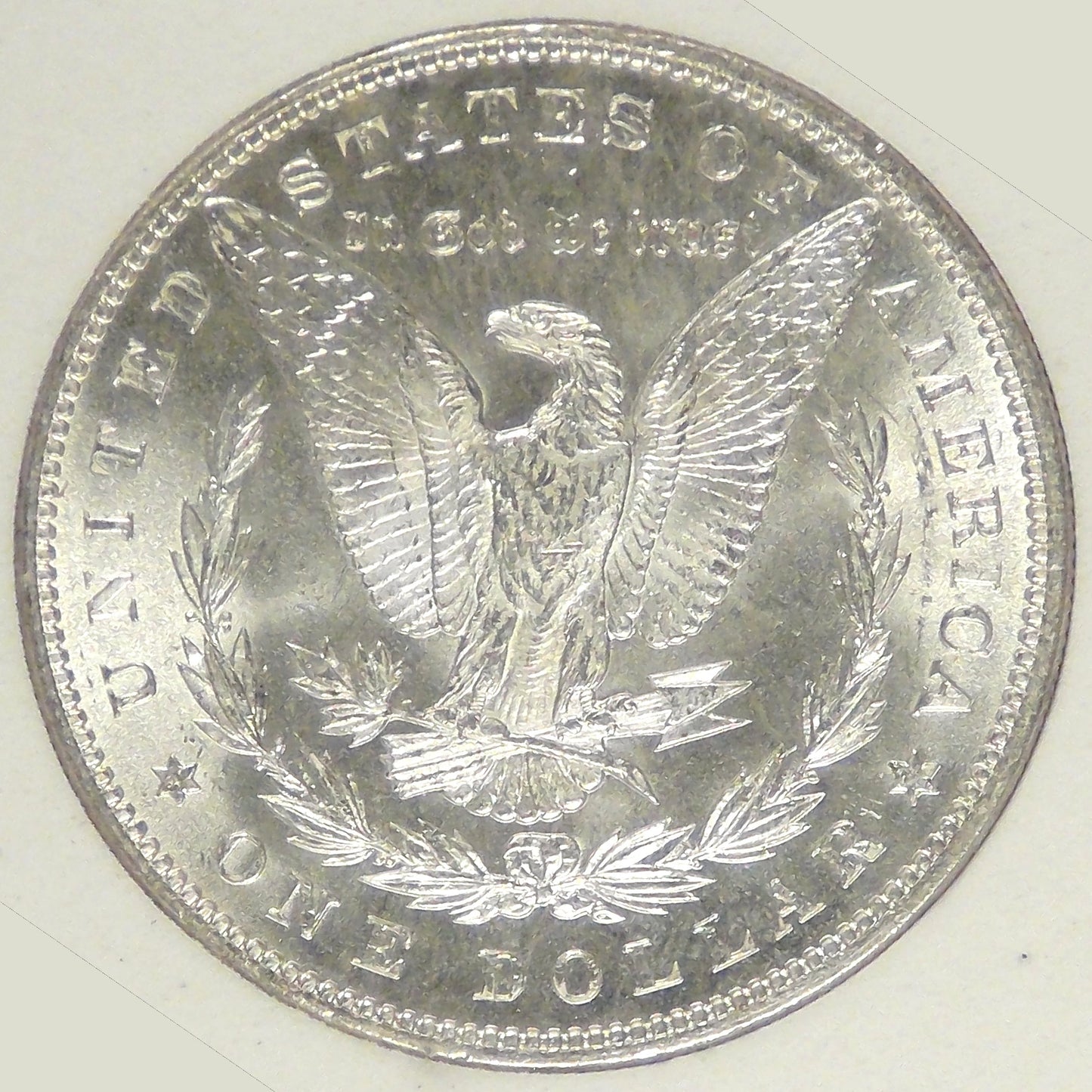 1887 Mogan Dollar, MS-63+ in SGS holder
