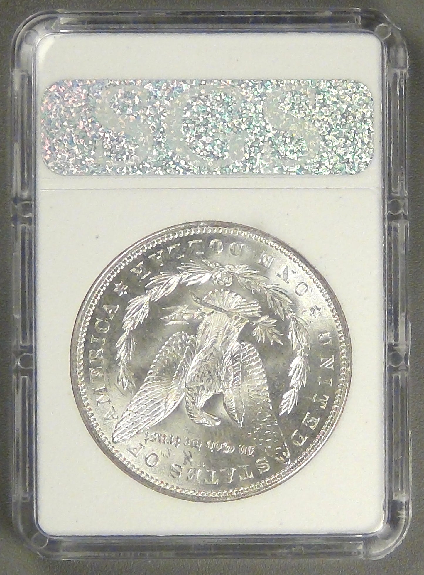 1887 Mogan Dollar, MS-63+ in SGS holder